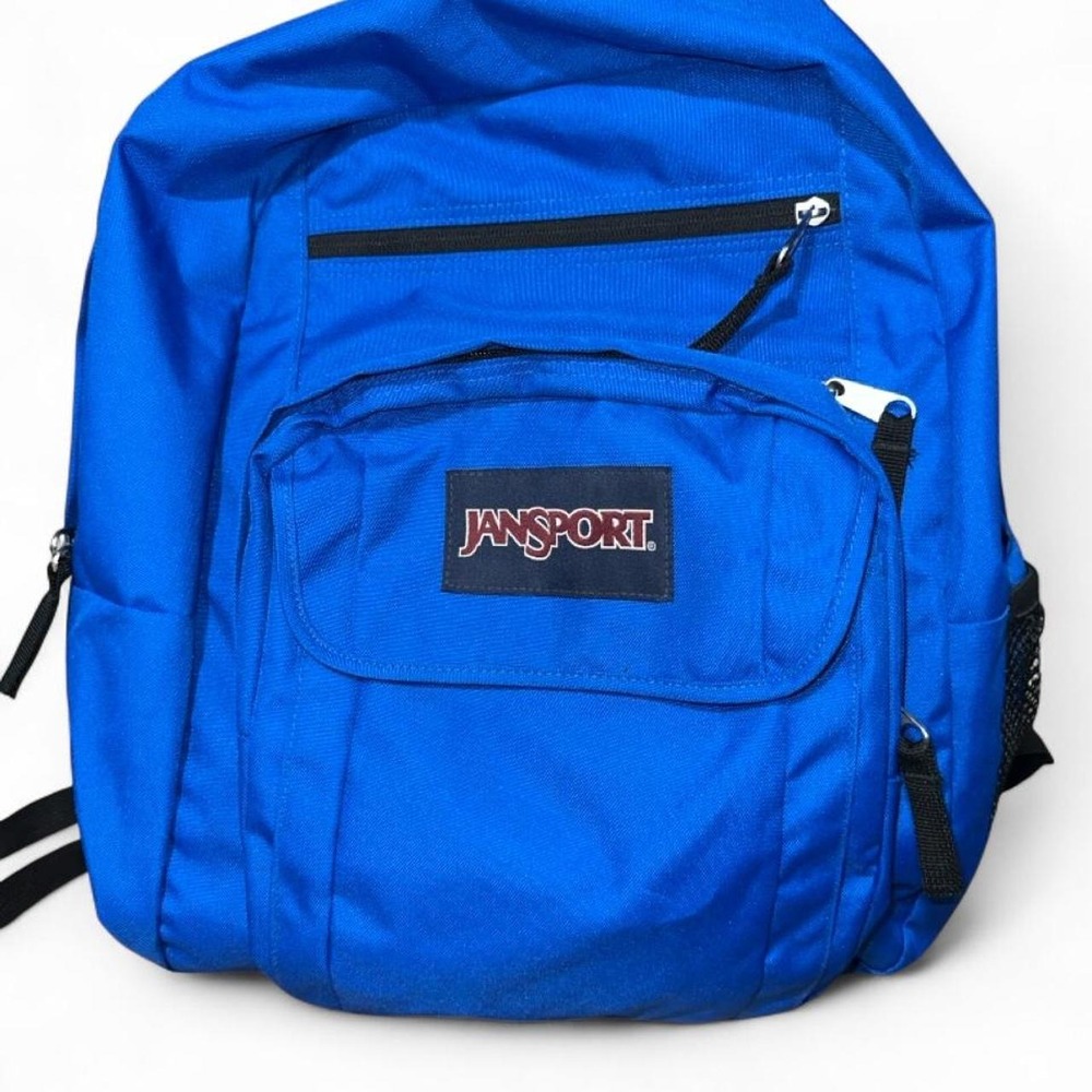 Jansport blue backpack with black accents